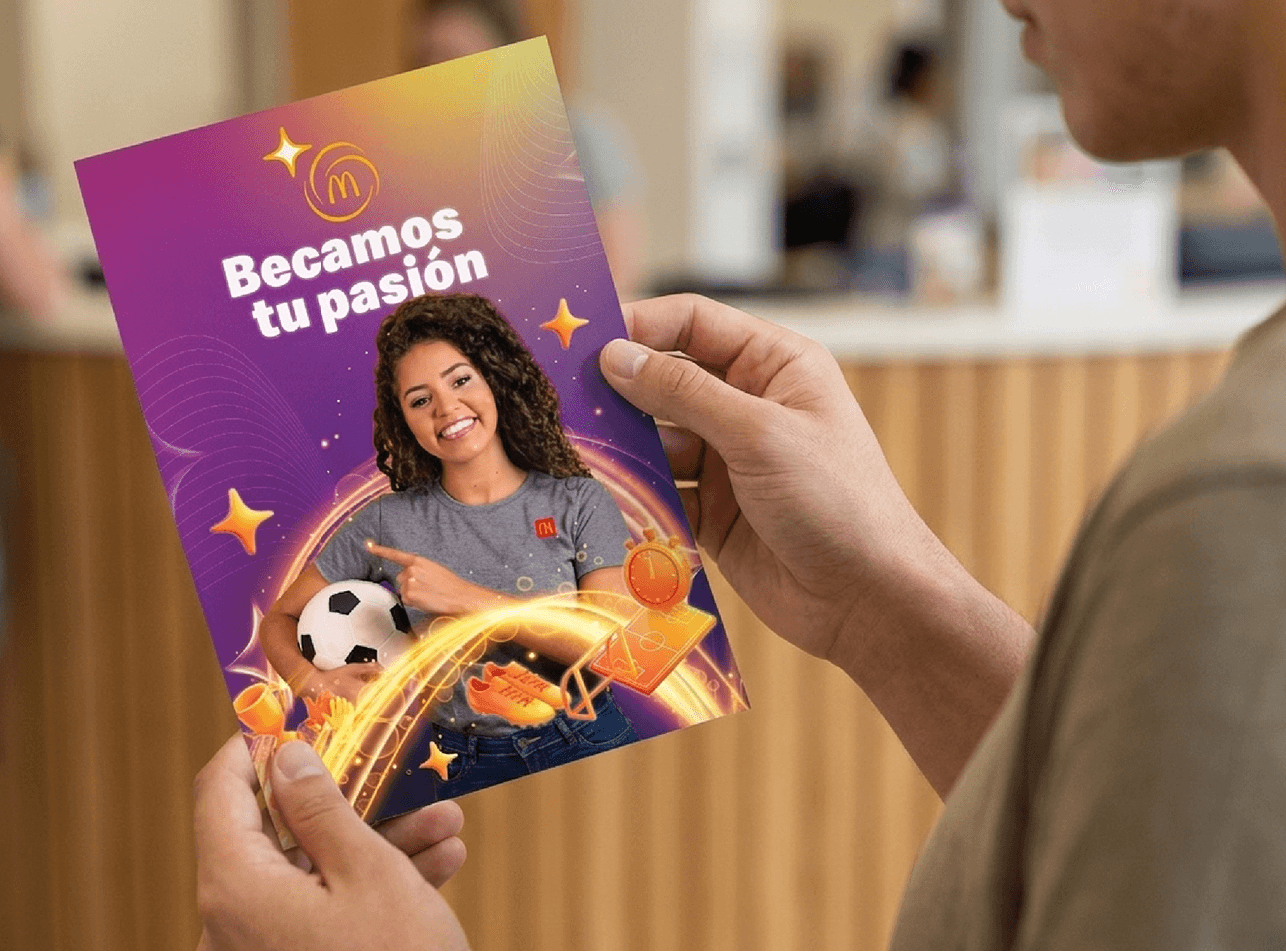 Becamos tu pasión promotional flyer featuring a soccer player