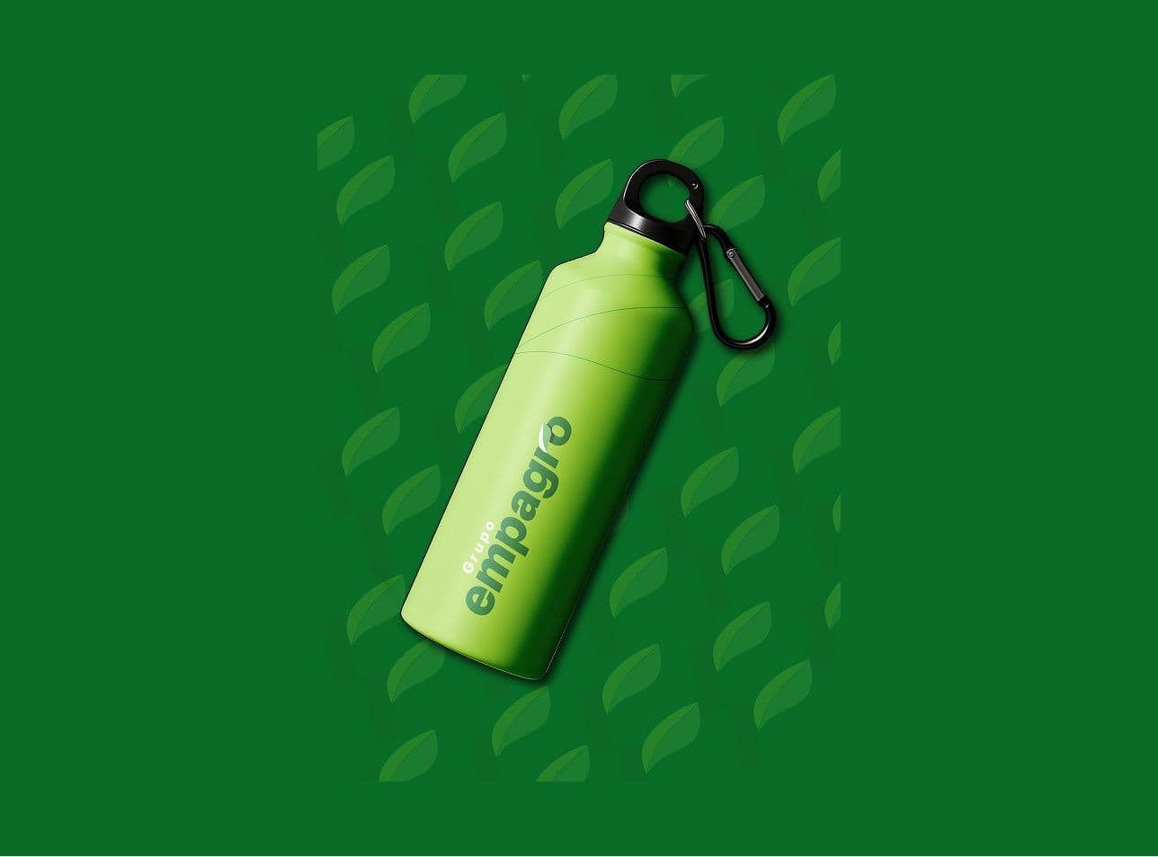 Lime-green Empagro water bottle on a repeating leaf-pattern background.
