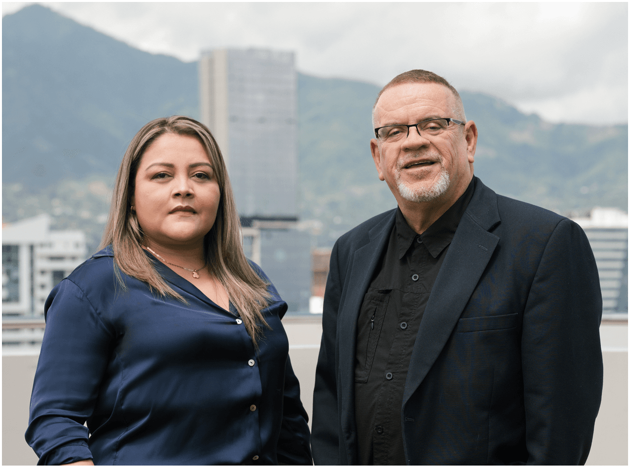the two lawyers posing in the city