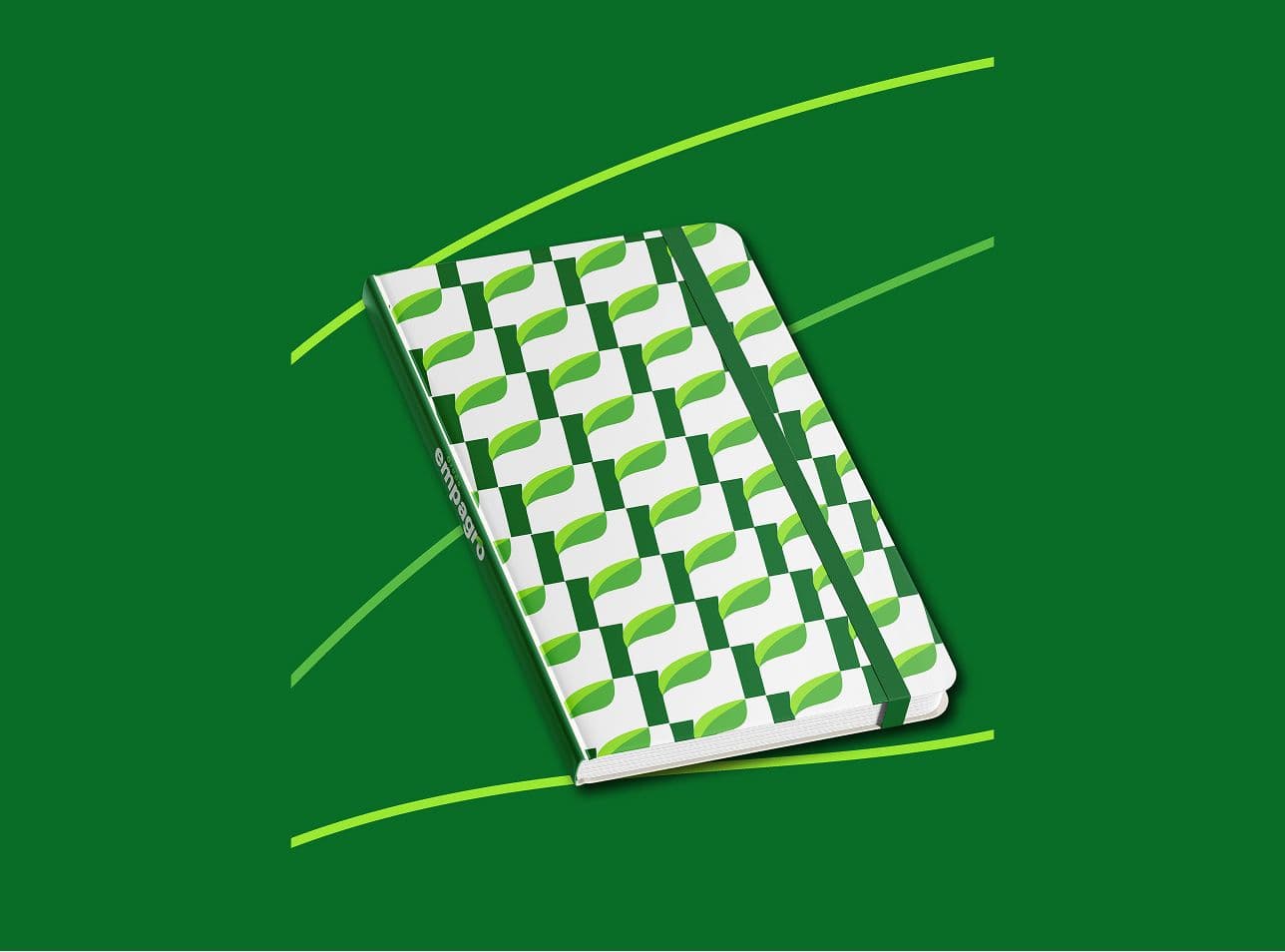 Empagro notebook with a green-and-white leaf pattern and elastic closure.