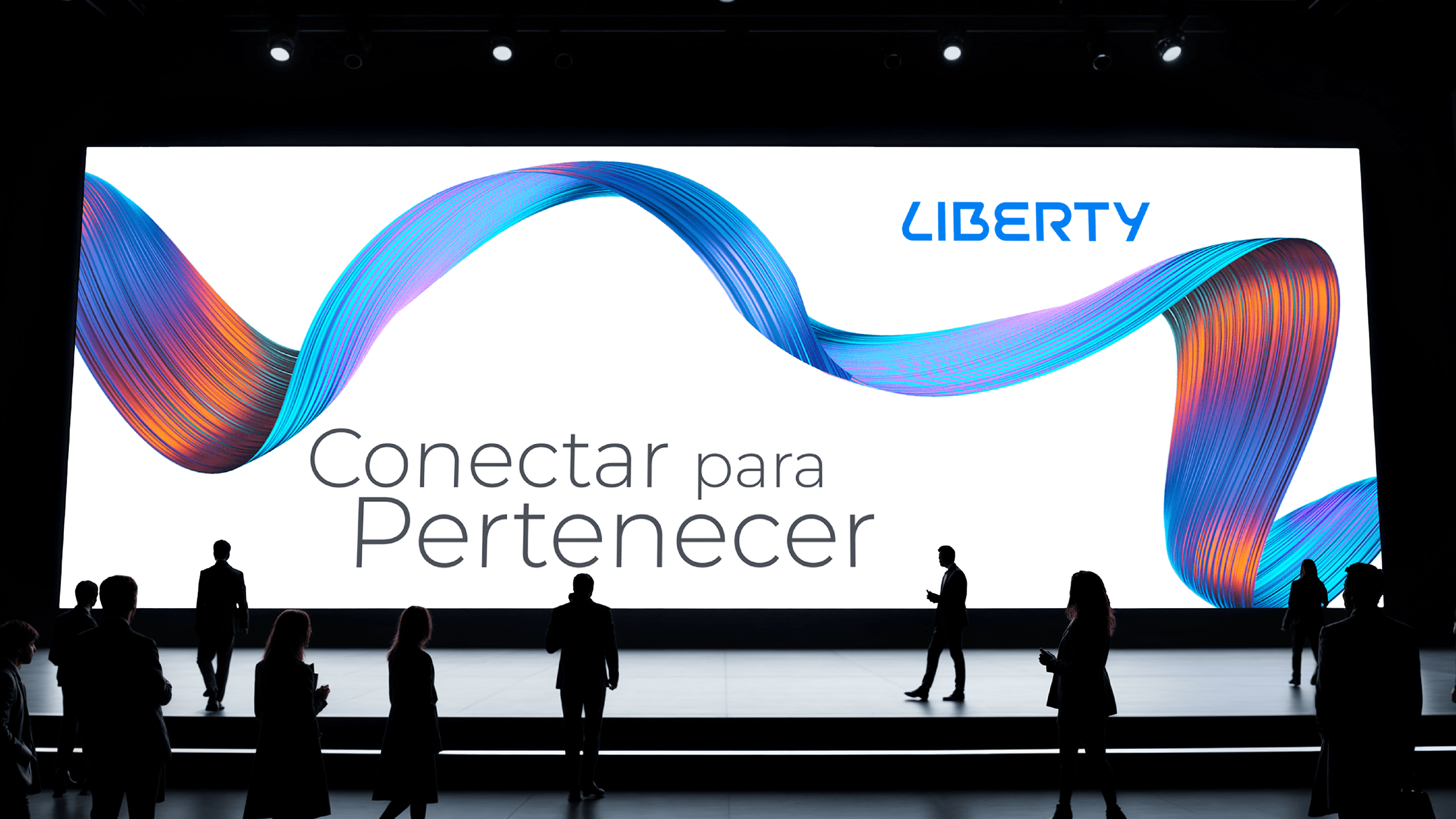 Large Liberty inclusion campaign display with flowing multicolor ribbons and the campaign tagline.